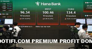 Currency dealers monitor exchange rates as an electronic screen shows the prices of WTI (L), Brent crude (C) and Dubai crude (R) in a foreign exchange dealing room at the Hana Bank headquarters in Seoul on March 13, 2026. (Photo by Jung Yeon-je / AFP)