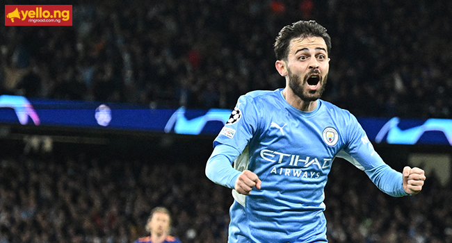 Manchester City's Portuguese midfielder Bernardo Silva celebrates after scoring his team fourth goal during the UEFA Champions League semi-final first leg football match between Manchester City and Real Madrid, at the Etihad Stadium, in Manchester, on April 26, 2022. Oli SCARFF / AFP