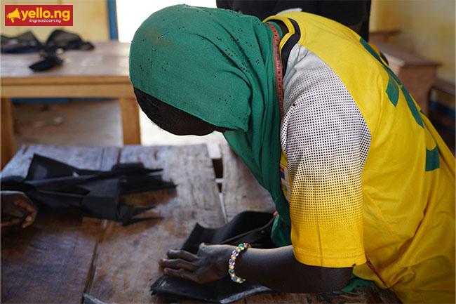 In a classroom in Bria, in the unstable eastern Central African Republic, a group of former child soldiers are learning to sew.