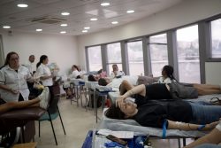 Israelis donate blood at Magen David Adom emergency service in Jerusalem, following an unprecedented attack by Hamas militants on Israel, on Oct. 7.
